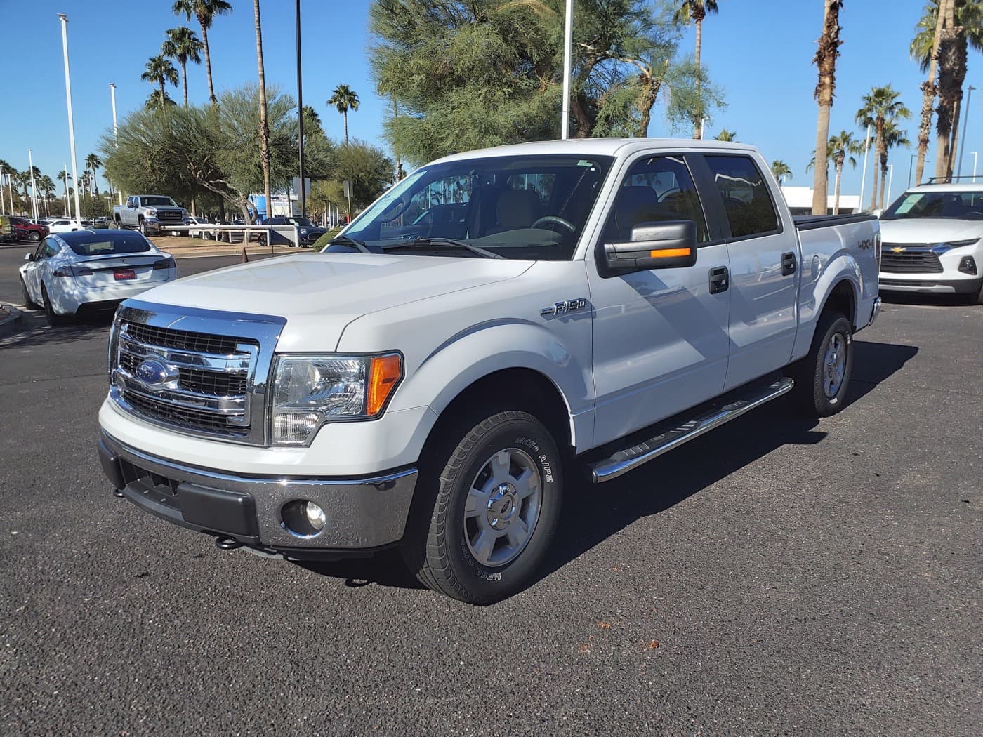 2014 Ford F-150 XLT pickup shown as a vehicle reference